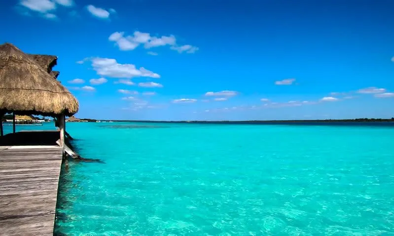 Blue lagoon shoreline in Bacalar near the Maya Train route