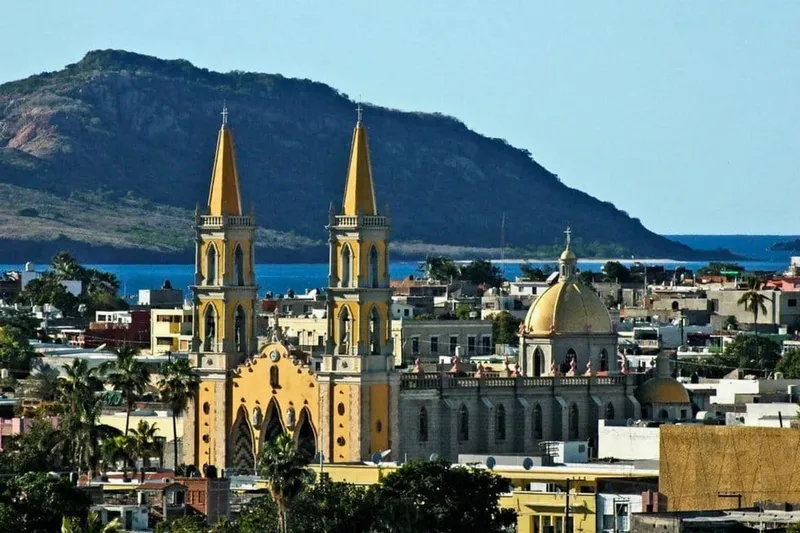 Mazatlán waterfront in September with warm Pacific water, seafood plans, rain, and flexible pacing