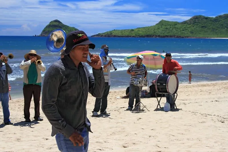 Traditional Sinaloa banda music performance with brass instruments in Mazatlan historic center