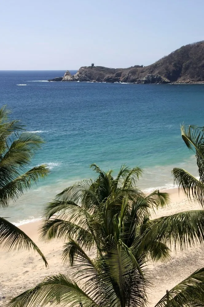 Rocky Mazunte coastline and Pacific coves below the hills