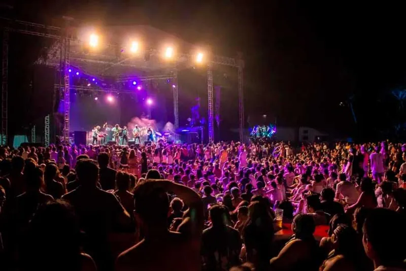 Evening gathering in Mazunte with beach-town music and lights