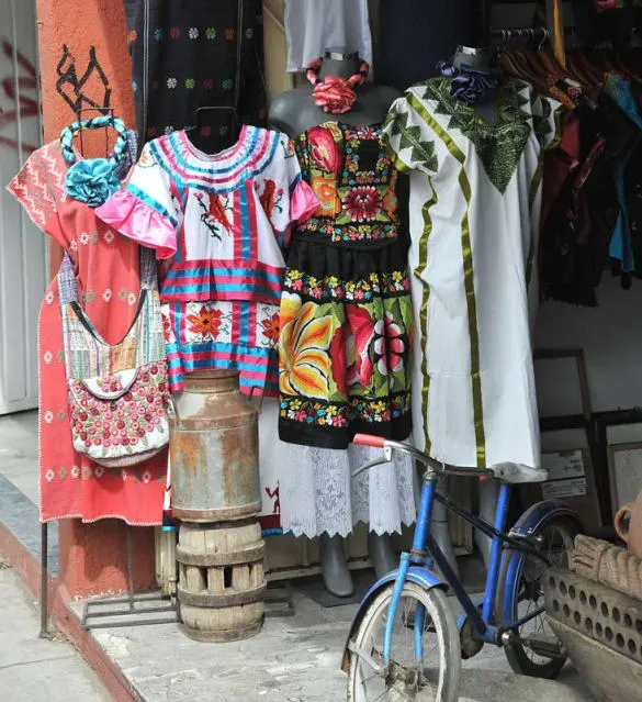 Embroidered Mexican huipil blouse with floral patterns