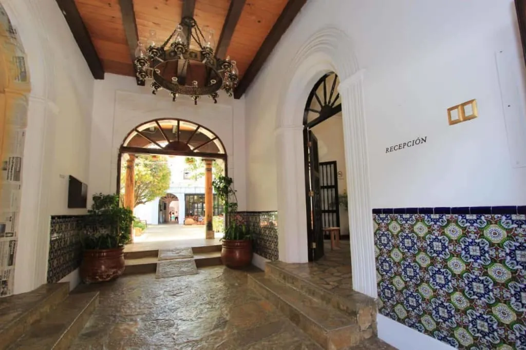 Courtyard and colonial arches at Hotel Sombra del Agua in Chiapas