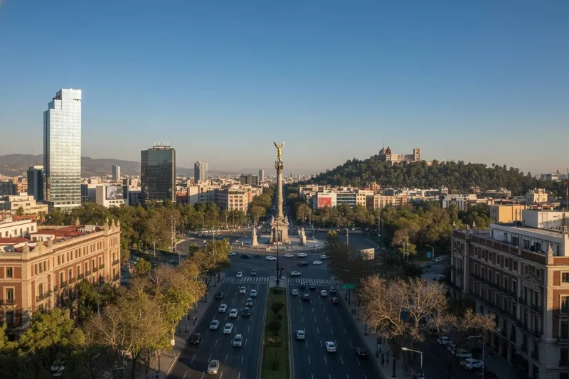 Clear daylight over Reforma towers and the trees of Chapultepec
