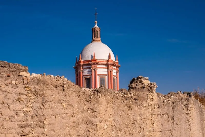 San Pedro Apostle Parish rising over Mineral de Pozos' historic center