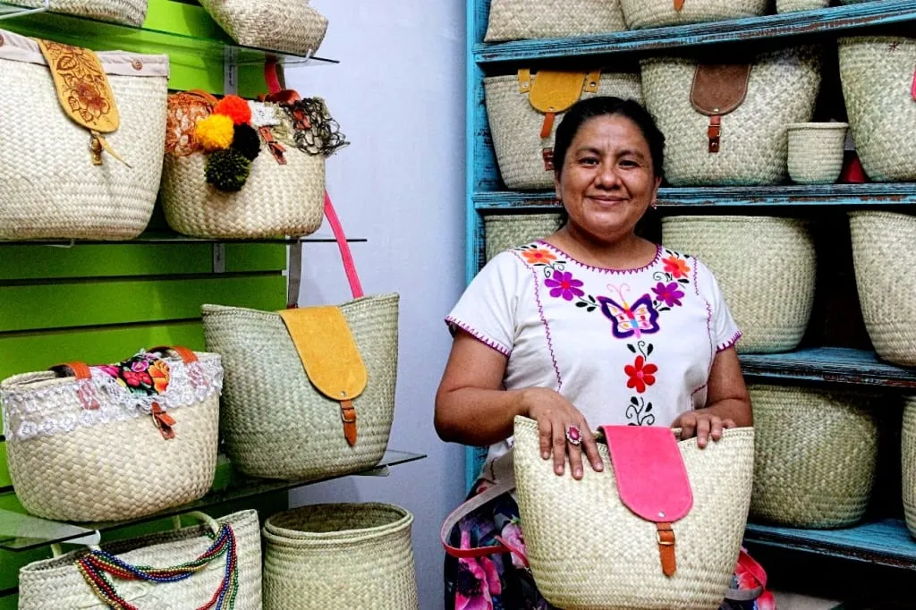 Colorful woven textiles and embroidered souvenirs made by Mitla artisans