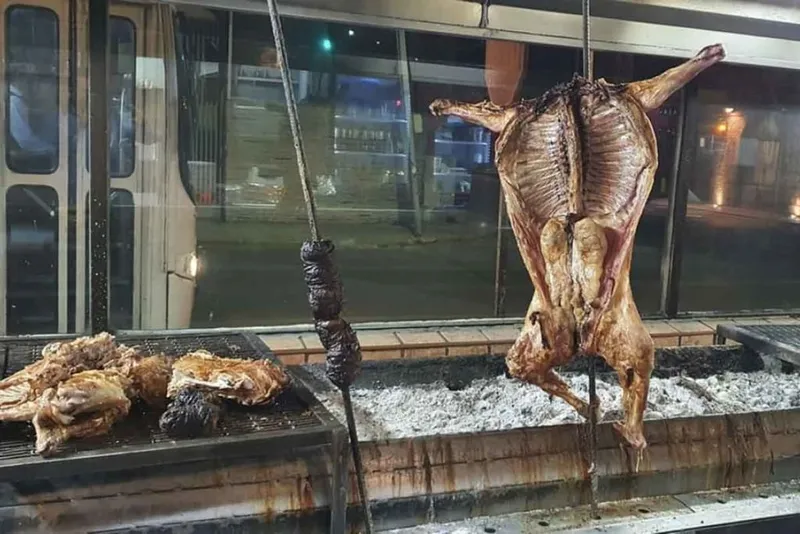 Cabrito al pastor — Monterrey's signature grilled dish, worth one last meal before your journey south