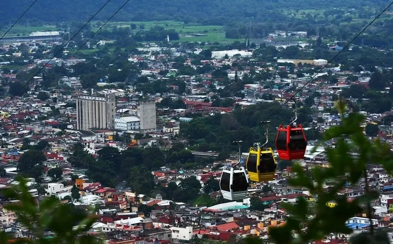 Teleferico de Orizaba cable car crossing above the city toward Cerro del Borrego