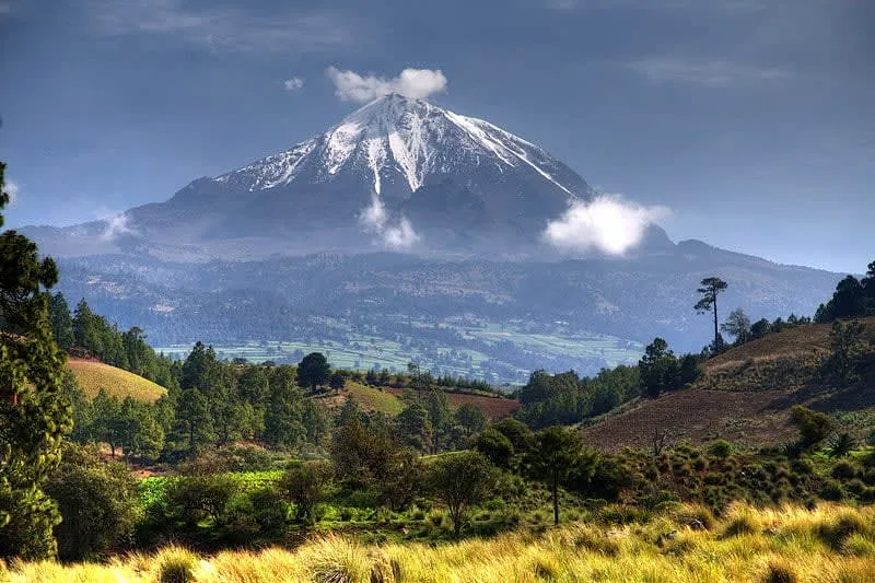Snow-capped Pico de Orizaba rising above the Veracruz highlands on a clear morning