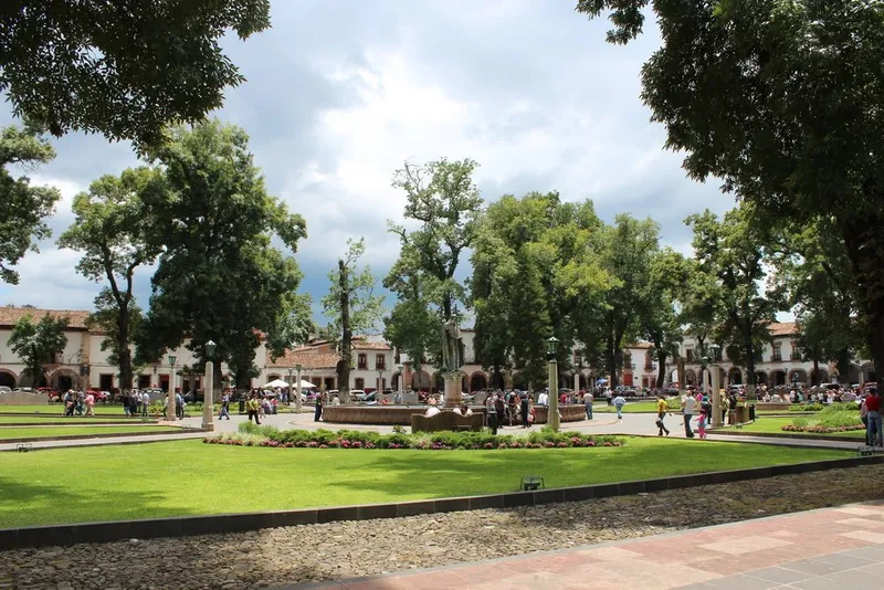 Shaded plaza paths and benches in the historic center of Pátzcuaro