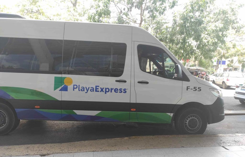 Colectivo shared minivan transport — the cheapest way from Playa del Carmen to Tulum along Highway 307