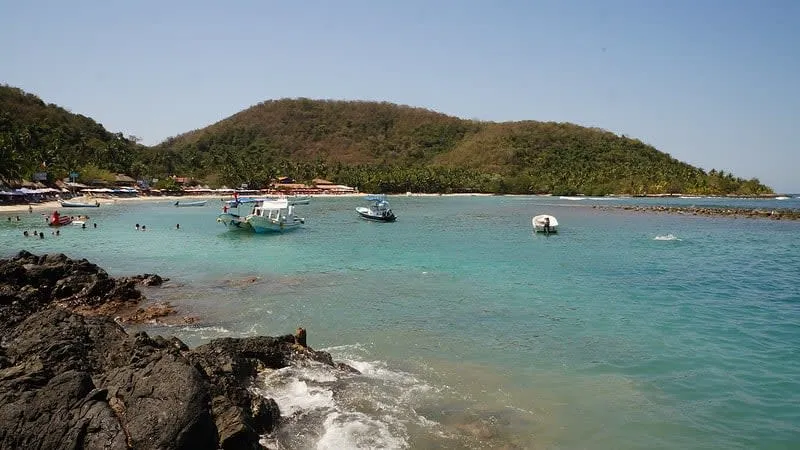 Playa Las Gatas near Zihuatanejo in December with warm bay water and dry-season beach conditions