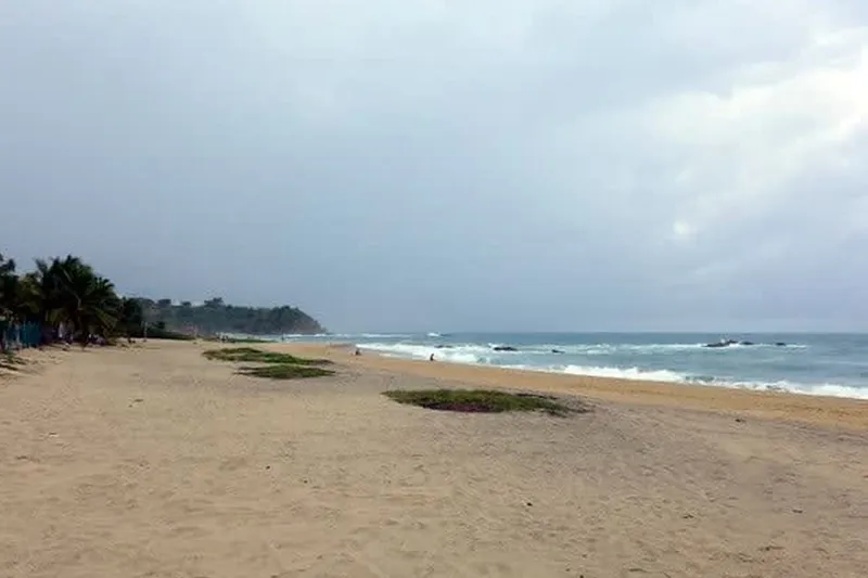 Pacific waves breaking along a wide Puerto Escondido beach