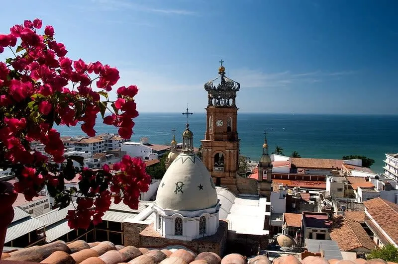 Puerto Vallarta Malecon with church tower near the waterfront