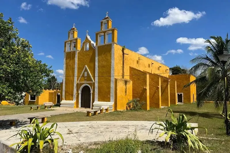 Remedios Chapel exterior with yellow walls in Izamal