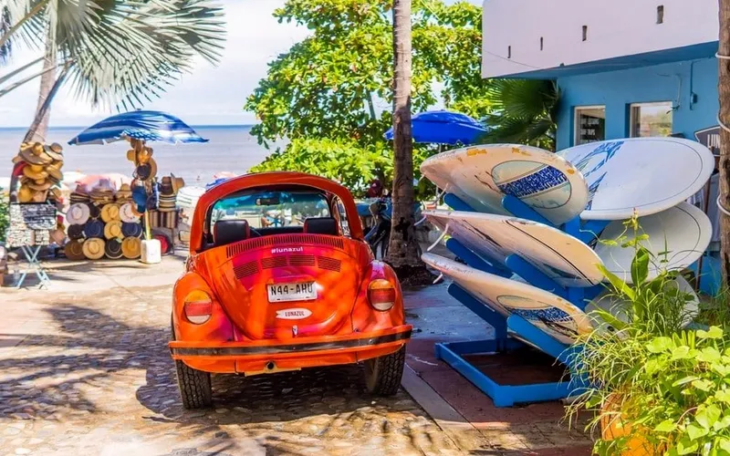 Colorful Sayulita street leading toward the beach on a clear dry-season day