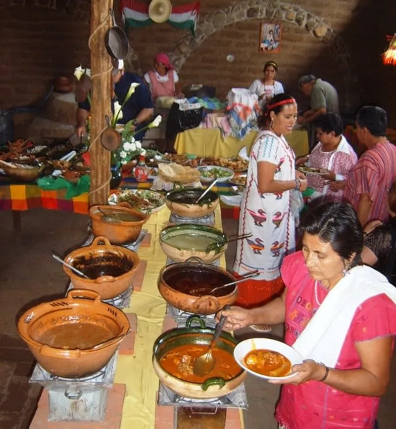 Chiapas artisan food products at market — pox sugarcane spirit and amber mezcal are the traditional drinks of highland San Cristóbal