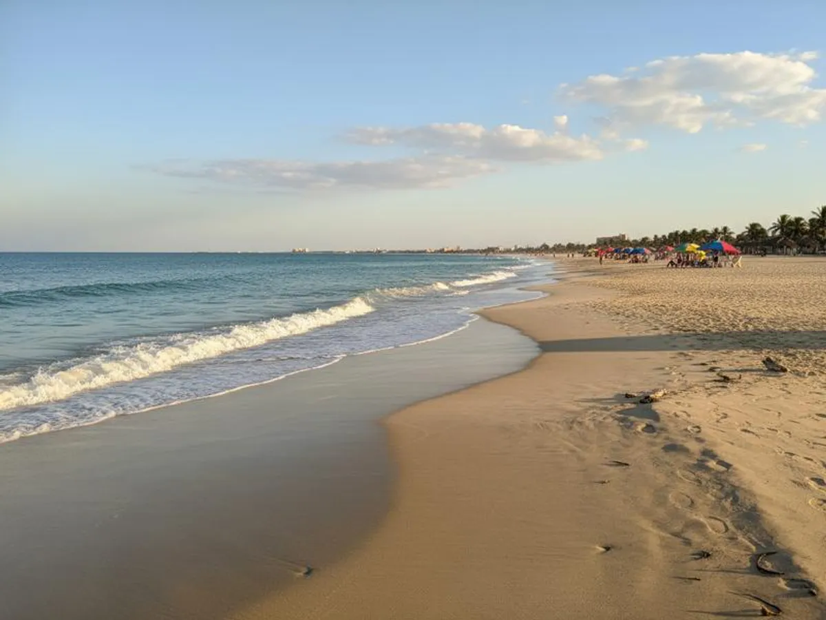 Miramar Beach near Tampico in April with warm Gulf Coast light, beach walks, seafood plans, and flexible swim conditions