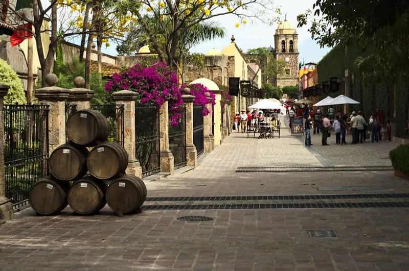 Tequila Jalisco town streets in September with warm rainy-season weather and green hills
