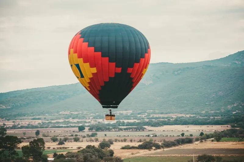 Hot air balloon in Tequisquiapan in May with early morning weather, wine country, and weekend planning