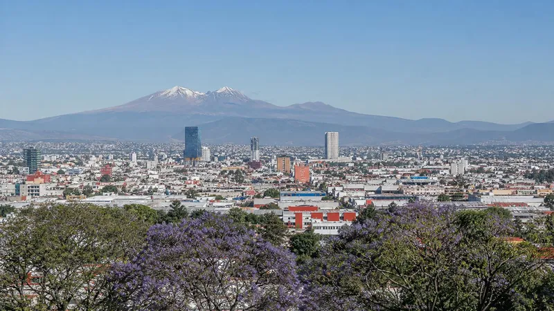 Clear March view over Toluca with Nevado de Toluca beyond the highland city