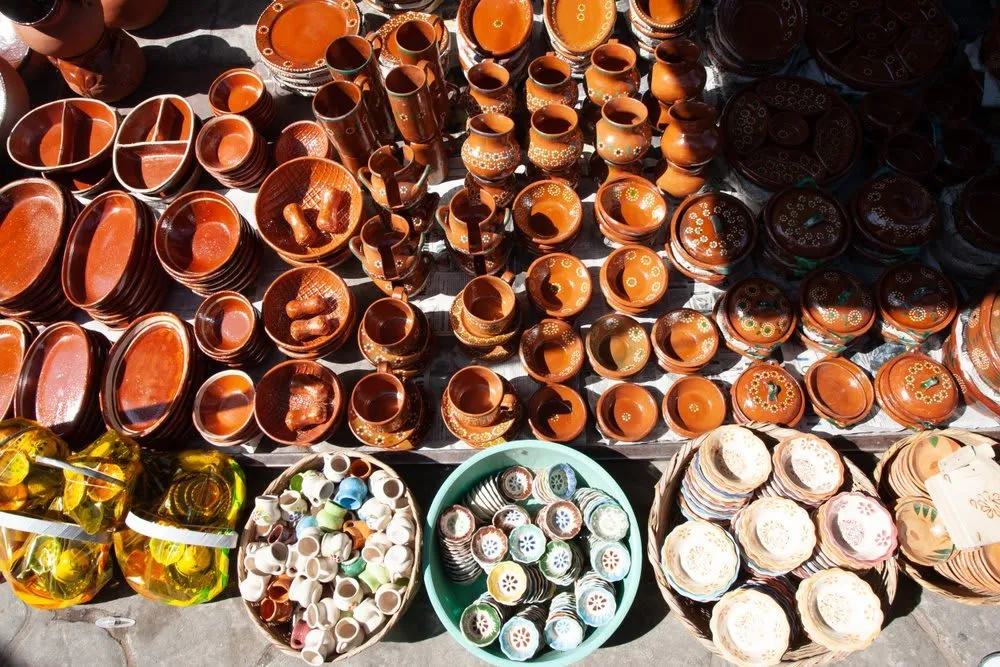 Street market stalls selling Tonala ceramics and handmade crafts