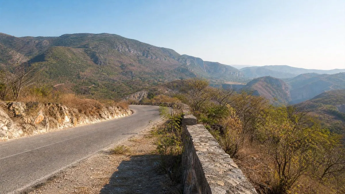 Dry March morning road through lowland Chiapas hills near Tuxtla Gutierrez