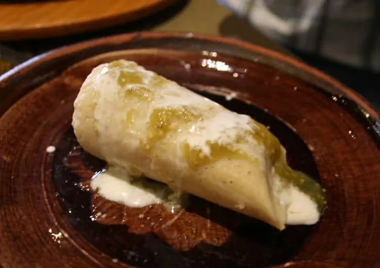 Fresh corn uchepos wrapped in pale corn husks