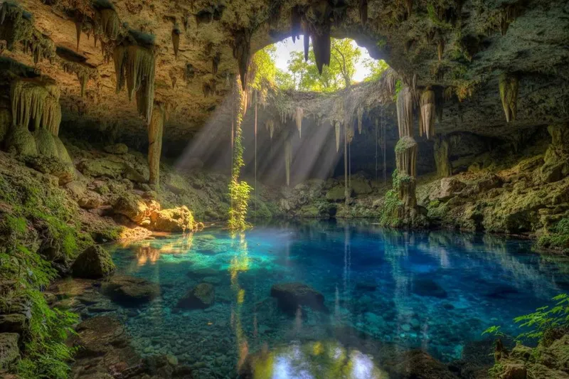 Colorful Valladolid street with colonial facades and August summer clouds in inland Yucatán