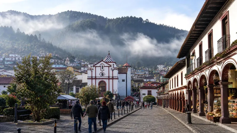 Zacatlán clock tower and red rooftops surrounded by cool Sierra Norte hills