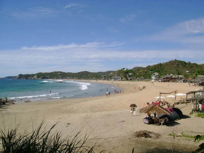 Rocky entrance to Playa Amor near Zipolite during May beach season