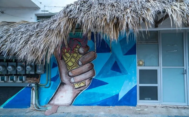 Colorful sandy lane in Zipolite during a hot May Oaxaca Coast trip