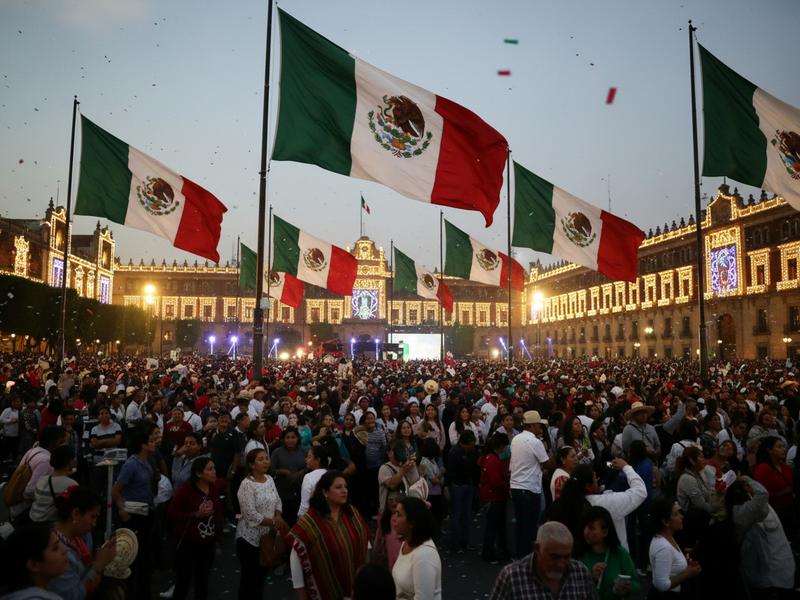 Mexico City Zocalo with flags and crowds before Independence Day
