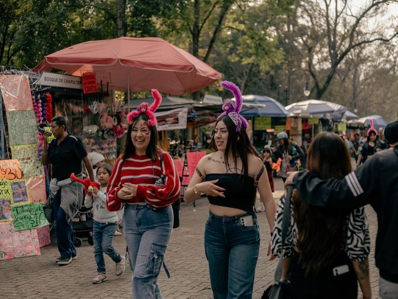 Light jacket, earplugs, sunscreen, power bank, and small festival bag prepared for Mexico City