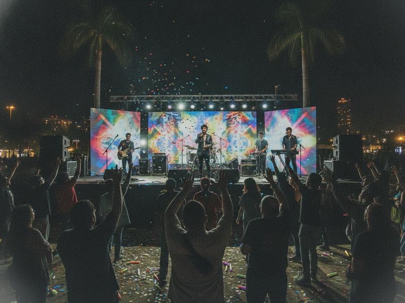 Colorful alternative music performance on the Friday stage at a Mexico City festival