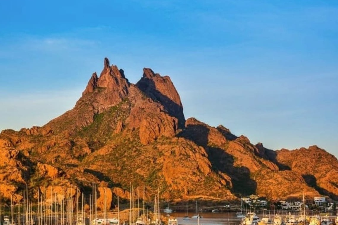 Rocky Sea of Cortez shore near Guaymas with October clouds over the Sonoran desert