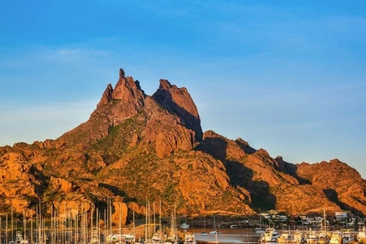 Rocky Sea of Cortez shore near Guaymas with September clouds over the Sonoran desert