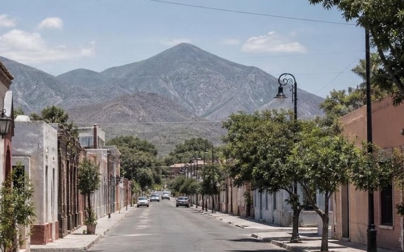 Sunny December street near Linares historic center with road-trip access south of Monterrey