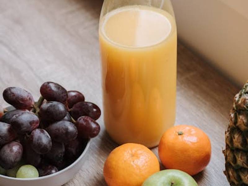 Traditional tepache fermented pineapple drink served in a glass with pineapple garnish