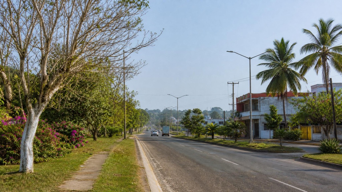 Warm April morning road scene in Minatitlan with southern Veracruz greenery and humid Gulf light