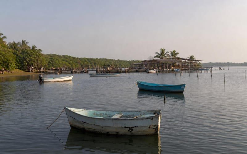 Fishing boats on Mecoacán Lagoon near Paraíso, Tabasco during a hot April morning